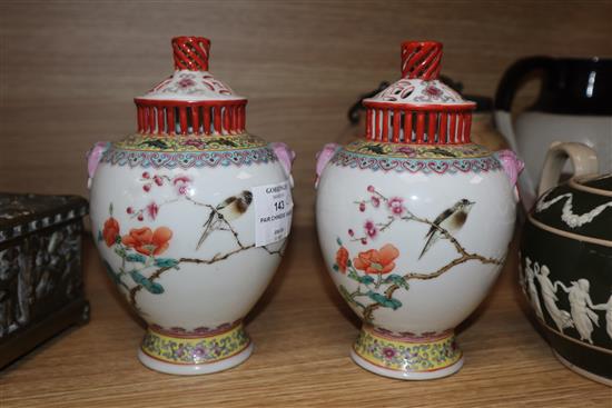 A pair of Chinese famille rose vases and covers, 20th century height 18.5cm